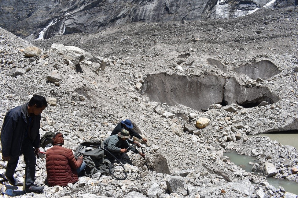 Performing stake monitoring at Satopanth Glacier